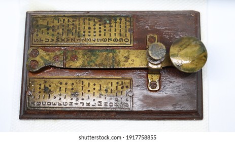 A Brass Telegram Used For Communications During Second World War Using Morse Code Encryption. Cryptography And Message Services.