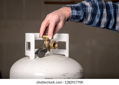 Brass Valve Twisted On The Top Of A Propane Bottle