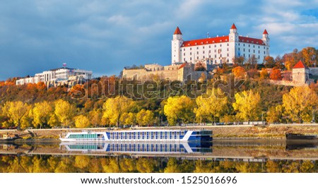 Bratislava castle, parliament and Cruise boat on Danube river , Bratislava, Slovakia
