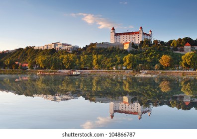 Bratislava Castle With Reflection In River Danube