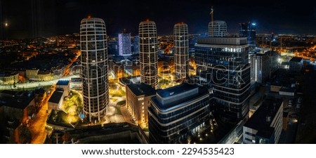 Bratislava city downtown skyline at night, illuminated modern high-rising buildings and traditional houses in Slovakia