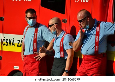 BRATISLAVA, September 13th 2021 - A Group Of Firefighters Taking A Break Next To Their Fire Truck While Waiting For The Next Steps During The Visit Of Pope Francis To Slovakia.