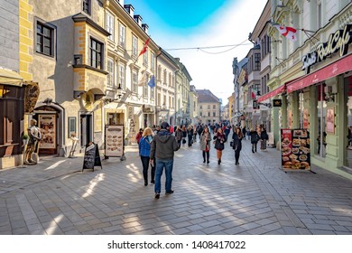 Bratislava, Slovakia - 16 February 2019 : People Walking Around The Main Square In The Old Town Of Bratislava