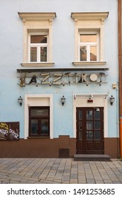 Bratislava, Slovakia - 16.08.2019: Building With Colorful Facade, 
Entrance To A Jazz Club And Sign Made With Musical Instruments