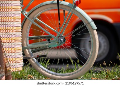 Bratislava, Slovakia - 24 August 2022: Woman Near The White Vintage Bicycle In The Park.