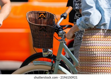 Bratislava, Slovakia - 24 August 2022: Selective Focus Of Handlebar And Wicker Basket Of Woman Bicycle.