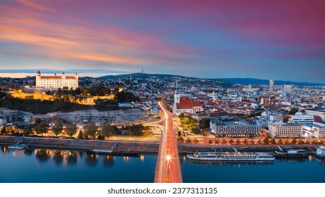 Bratislava, Slovakia. Aerial cityscape image of Bratislava, capital city of Slovakia during beautiful autumn sunset.
