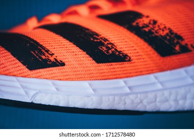 BRATISLAVA, SLOVAKIA - APRIL, 23, 2020: Adidas Adizero Boston 8 Running Shoes, Version 2020, Orange Signal Coral Color, Detail Photo, Lightstrike Foam And Adidas Ultra Boost. Continental Sole.