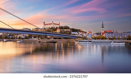 Bratislava, Slovakia. Cityscape image of Bratislava, capital city of Slovakia during beautiful autumn sunset.