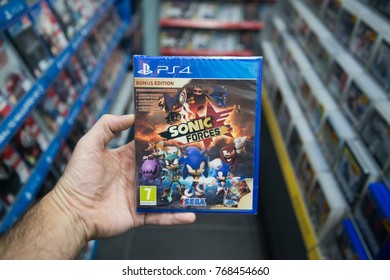 Bratislava, Slovakia, December 1, 2017: Man Holding Sonic Forces Videogame On Sony Playstation 4 Console In Store