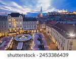 BRATISLAVA, SLOVAKIA - December 19, 2016: Christmas market on the Main square in evening dusk.