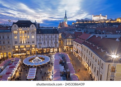 BRATISLAVA, SLOVAKIA - December 19, 2016: Christmas market on the Main square in evening dusk.