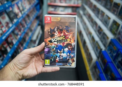 Bratislava, Slovakia, December 2, 2017: Man Holding Sonic Forces Videogame On Nintendo Switch Console In Store