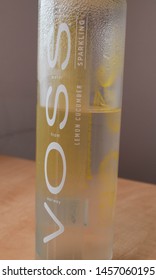 Bratislava, Slovakia - Jul 21, 2019: Voss Cooled Norway Water Bottle With A Flavor Of The Lemon And Cucumber On The Table 