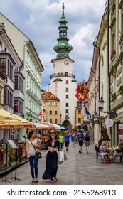 Bratislava, Slovakia - June 25, 2014: Walking People In Shopping Street By Michael's Tower In Bratislava