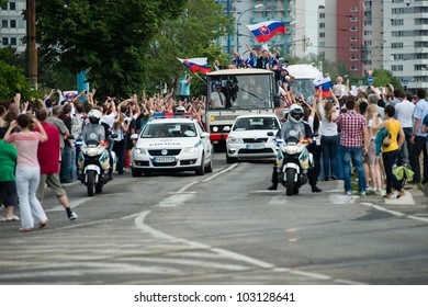 BRATISLAVA, SLOVAKIA - MAY 21: Slovak Ice Hockey Team On The Bus Celebrate The Silver Medal Win In Men's World Ice Hockey Championships On May 21, 2012 In Bratislava, Slovakia