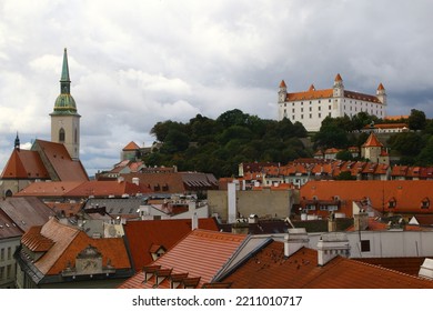 Bratislava, Slovakia - September 9, 2022: Aerial Summer View Of Central Part Of Slovakian Capital City With Hlavné Námestie (Main Square), Churches And Ancient Hrad (castle) In Background. 