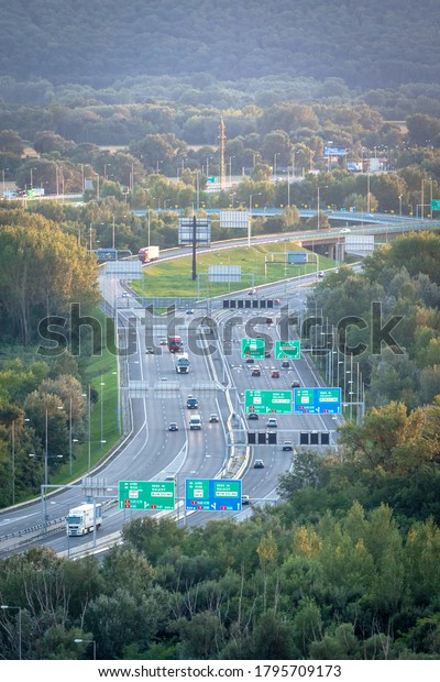 Bratislava/Slovakia - 08/26/2015: View on Bratislava`s\
highway to Czech republic and Austria from the new bridge (SNP\
bridge). 