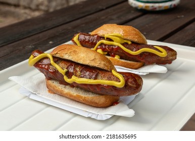 Bratwurst german natural sausages with sauce and bun - Shutterstock ID 2181635695