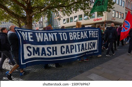 Braunschweig, Germany, September 20., 2019: Poster of a left group on the Friday demonstration of climate protectors calling for the abolition of capitalism