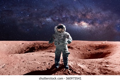 Brave Astronaut At The Spacewalk On The Mars. This Image Elements Furnished By NASA.