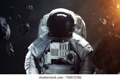 Brave astronaut at the spacewalk. People in space. Elements of this image furnished by NASA