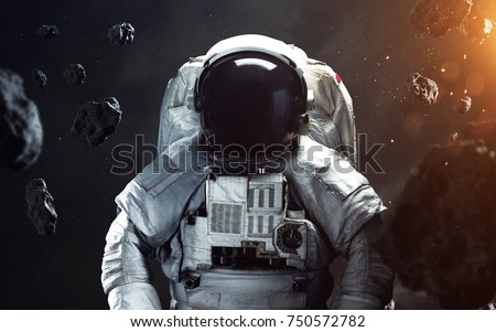 Brave astronaut at the spacewalk. People in space. Elements of this image furnished by NASA