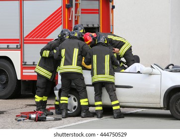 brave firefighters relieve an injured after car accident