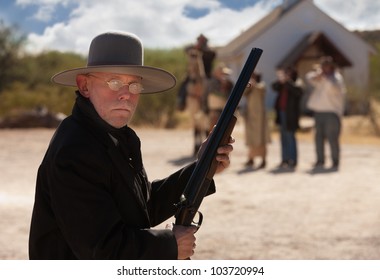 Brave Old West Cowboy Under Attack From Outlaws