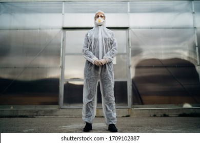 Brave Paramedic In The Front Lines.COVID-19 Emergency Room Triage Doctor Fighting Coronavirus In Private Protective Equipment (PPE).COVID-19 Coronavirus Doctor In A Hazmat Suit.