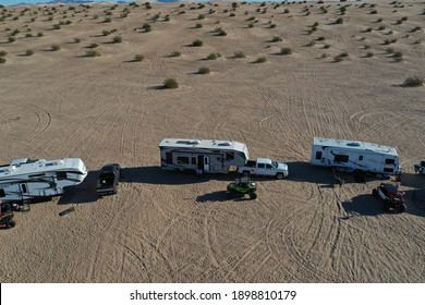 Brawley, CA USA January 2021: Campers camping in RV's at the sand dunes