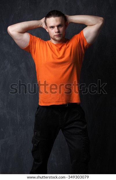 orange shirt guy