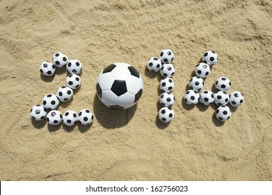 Brazil 2014 World Cup Message In Football Soccer Balls On Beach In Rio