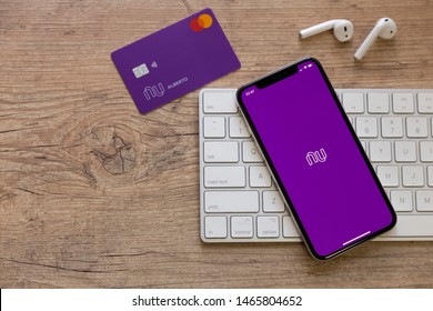 Brazil; July 29, 2019: Nubank logo on the screen of the mobile device and creditcard. Nubank is a Brazilian company in the segment of financial services and digital bank. largest Brazilian fintech