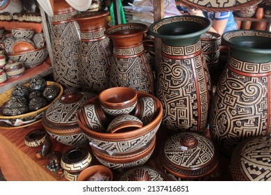 Belém, Pará, Brazil, March 2022. Marajoara ceramics, ceramics of indigenous origin, Amazon ceramics, for sale at the Ver-o-peso market in Belém PA, native craft, clay jar - Shutterstock ID 2137416851