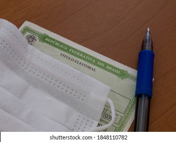 Brazil - November 2, 2020: Detail Of The Title Of Brazilian Voter, Face Mask And Pen. In 2022, There Will Be Presidential Election In Brazil