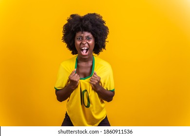 Brazil Supporter. Brazilian Woman Fan Celebrating On Soccer.Football Match On Yellow Background. Brazil Colors.