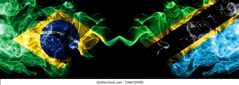 Brazil vs Tanzania, Tanzanian smoke flags placed side by side. Thick colored silky smoke flags of Brazilian and Tanzania, Tanzanian