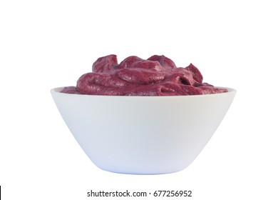 Brazilian Acai Into A Bowl Isolated On White Background