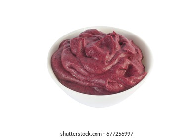 Brazilian Acai Into A Bowl Isolated On White Background