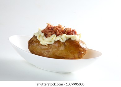 Brazilian Beef Stuffed Potatoes inside the white plate on the table - Shutterstock ID 1809995035
