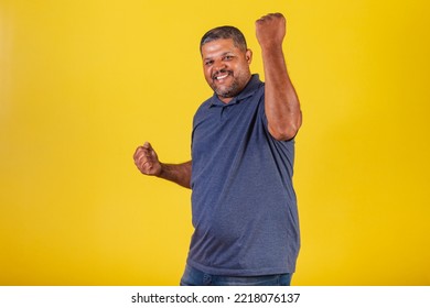 Brazilian Black Man, Adult Smiling Looking At Camera. Celebrating