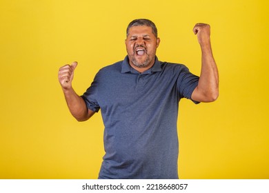 Brazilian Black Man, Adult Smiling Looking At Camera. Celebrating