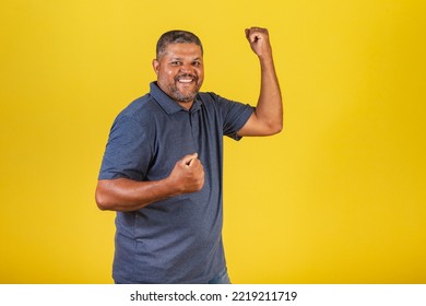 Brazilian Black Man, Adult Smiling Looking At Camera. Celebrating