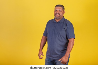 Brazilian Black Man, Adult Smiling Looking At Camera.