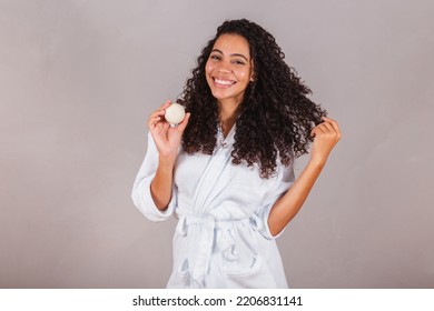 Brazilian black woman, wearing bathrobe and towel. vegan products for beauty and skin and hair care. soaps, Spa, self care. welfare. - Shutterstock ID 2206831141