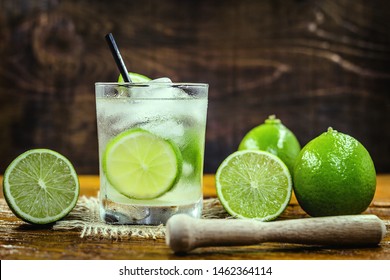 Brazilian Caipirinha, typical Brazilian cocktail made with lemon, cachaça and sugar. Traditional brazil drink, isolated with space for text. - Shutterstock ID 1462364114