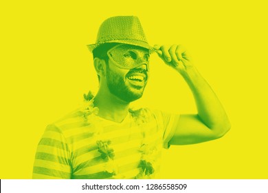 Brazilian Carnival Concept. Duotone Portrait Of Young Brazilian Man Wearing Carnival Costume