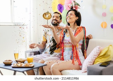 Brazilian Carnival. Couple celebrating carnival at home - Shutterstock ID 2114811986