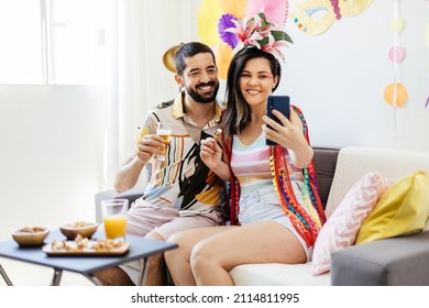 Brazilian Carnival. Couple celebrating carnival at home - Shutterstock ID 2114811995